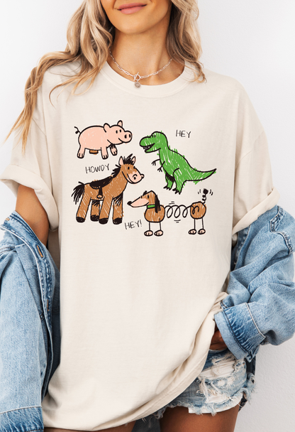 Person wearing a cream-colored t-shirt with cartoon animal designs on a white background