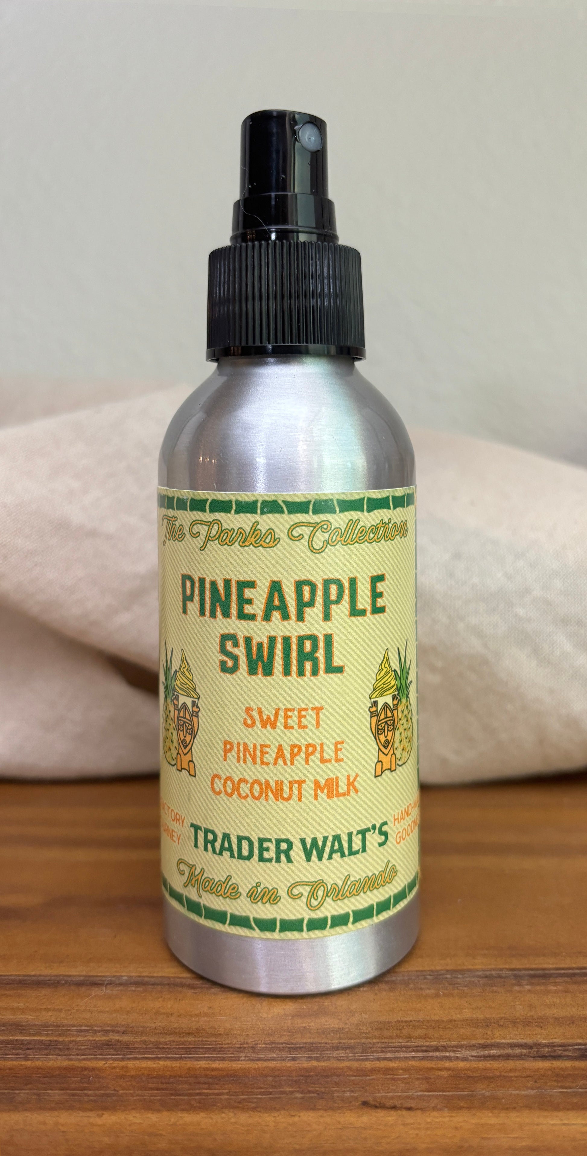 Bottle of Trader Joe's Pineapple Swirl on a wooden surface with a neutral background